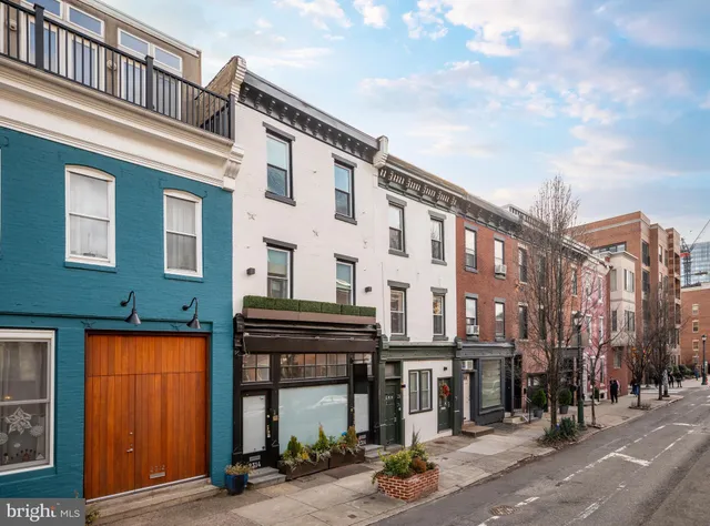 a front view of a building with street view