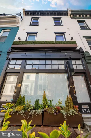 a kitchen with a stove and a microwave