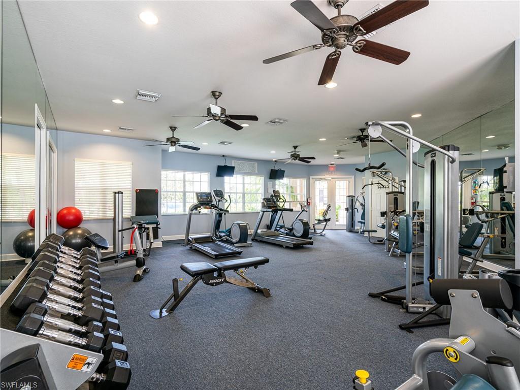 26479 Lucky Stone Road, Unit 202 Bonita Springs, FL 34135 - Photo 35 of 38 a view of a room with gym equipment