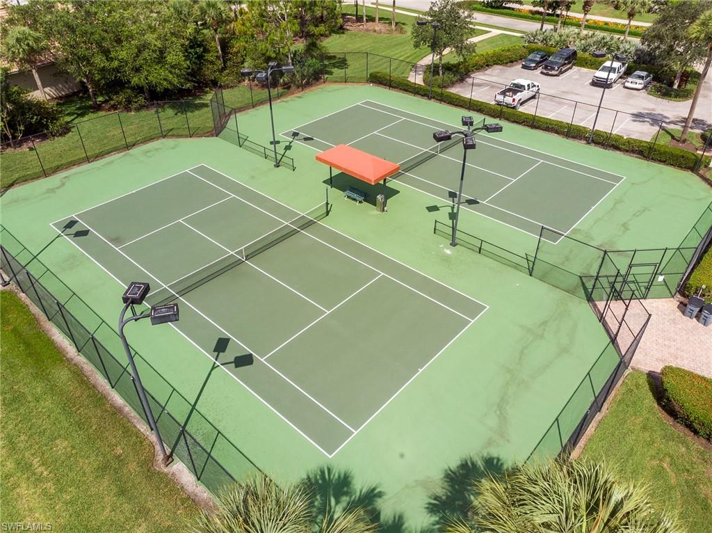 26479 Lucky Stone Road, Unit 202 Bonita Springs, FL 34135 - Photo 37 of 38 a view of a tennis court