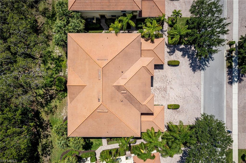 26479 Lucky Stone Road, Unit 202 Bonita Springs, FL 34135 - Photo 38 of 38 an aerial view of a house with yard and swimming pool