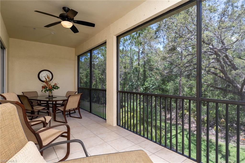 26479 Lucky Stone Road, Unit 202 Bonita Springs, FL 34135 - Photo 9 of 38 a view of a balcony with furniture