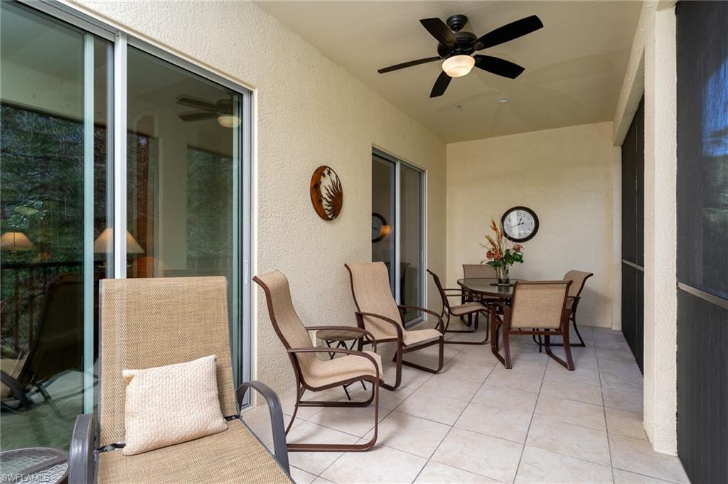 26479 Lucky Stone Road, Unit 202 Bonita Springs, FL 34135 - Photo 10 of 38 a view of a livingroom with furniture and a window