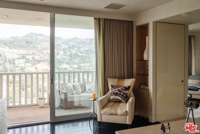 a room with furniture and a window