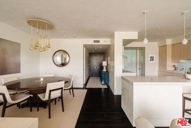 a view of a living room and dining room