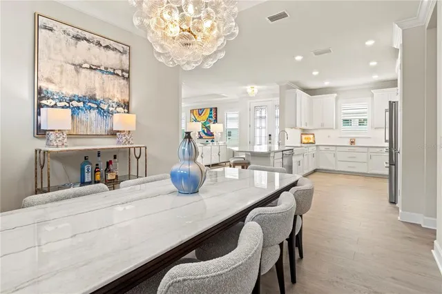 a view of a patio with a table chairs and a table
