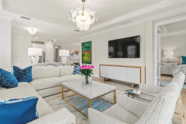 a kitchen with cabinets stainless steel appliances and window