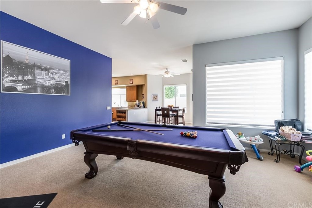 5 Champagne Circle Rancho Mirage, CA 92270 - Photo 18 of 41 a room with pool table and windows