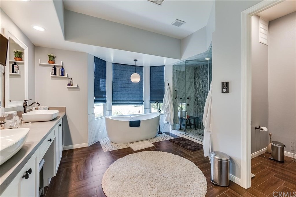 5 Champagne Circle Rancho Mirage, CA 92270 - Photo 25 of 41 a view of bathroom with dual sinks