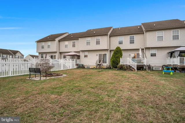 a view of a cars parked in front of a building