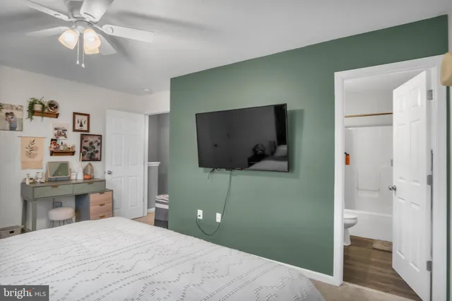 a bathroom with a sink vanity and a mirror