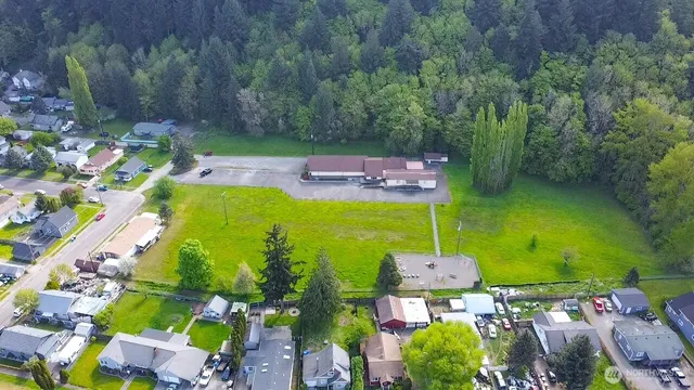 an aerial view of a house with a garden