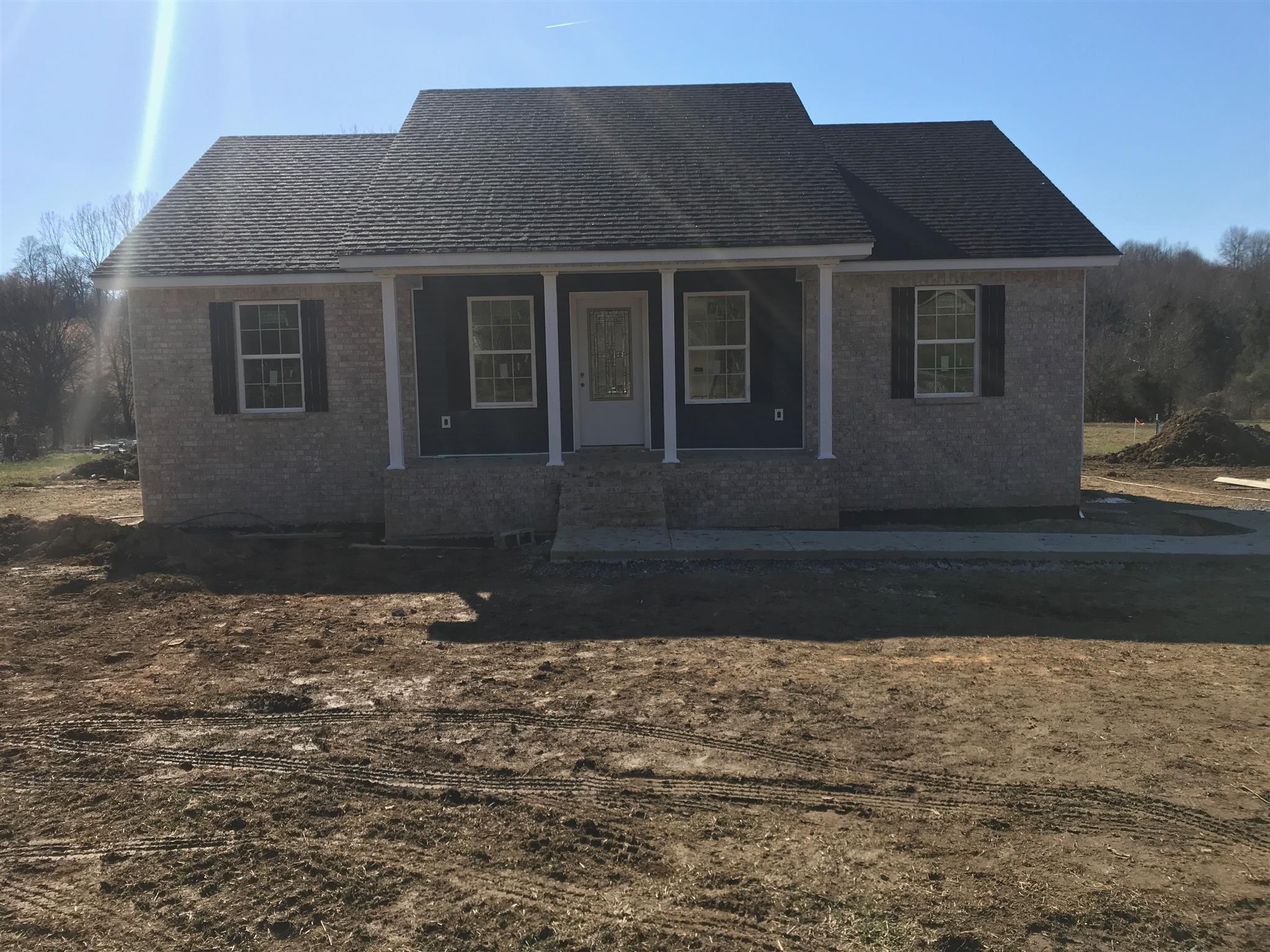 1905 Rock Bridge Road Bethpage, TN 37022 - Photo 2 of 3 a front view of a house with a yard