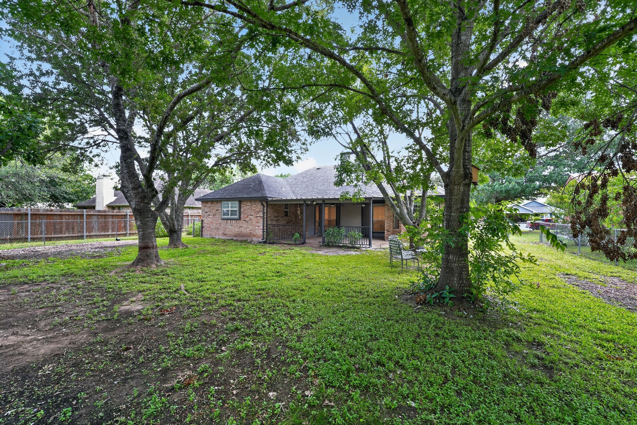 102 Hummingbird Lane Lockhart, TX 78644 - Photo 28 of 30 Large, shady, beautiful trees, back yard