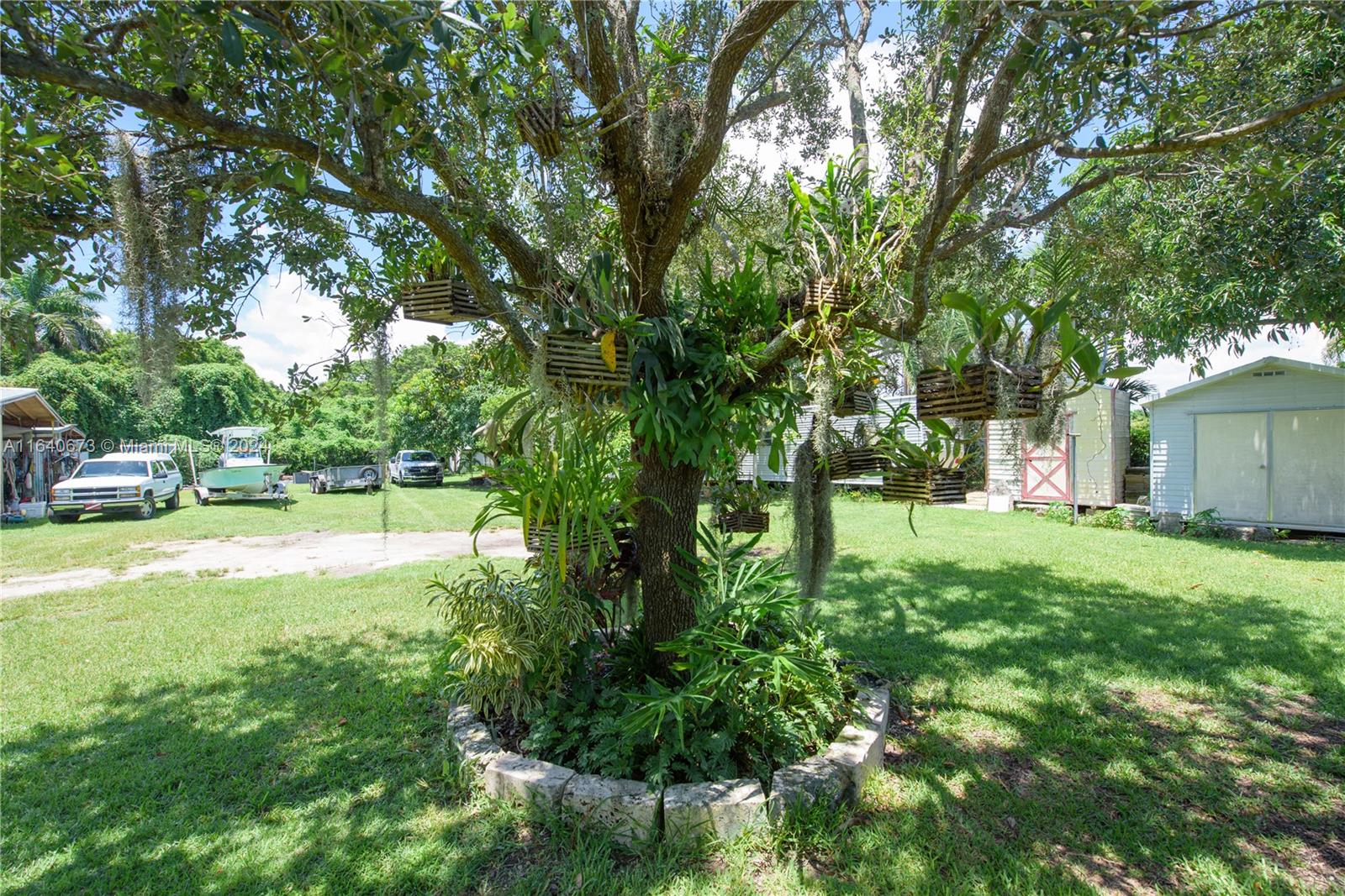 29744 Southwest 170th Avenue Homestead, FL 33030 - Photo 12 of 44 a view of backyard with swimming pool