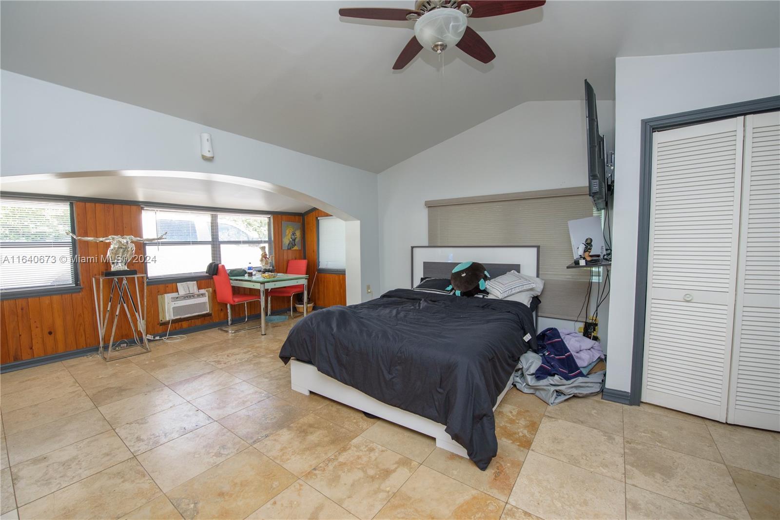29744 Southwest 170th Avenue Homestead, FL 33030 - Photo 25 of 44 a bed room with a bed and a large window