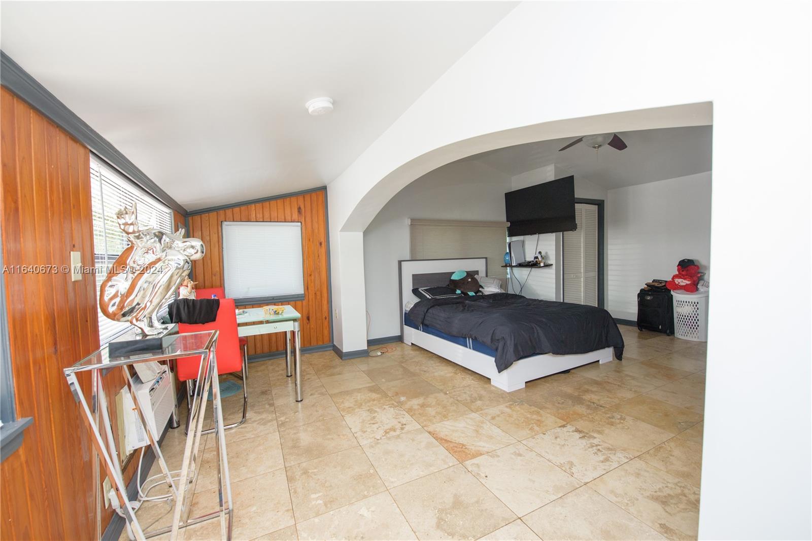 29744 Southwest 170th Avenue Homestead, FL 33030 - Photo 28 of 44 a living room with furniture and flat screen tv