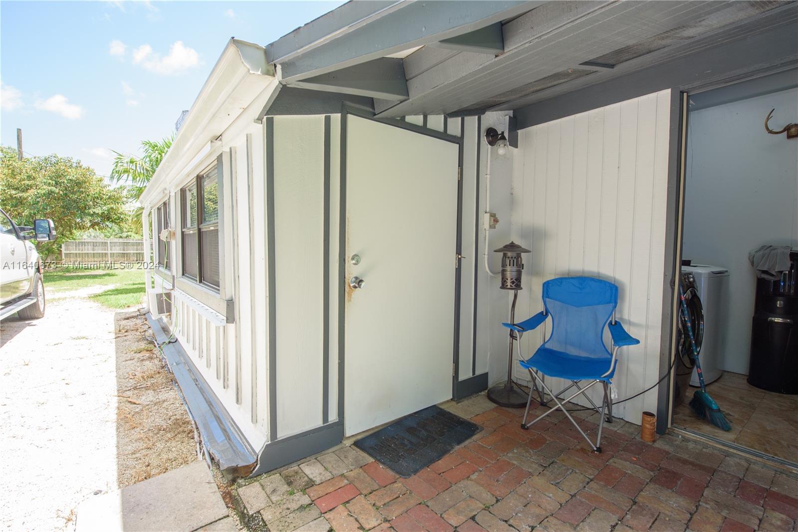 29744 Southwest 170th Avenue Homestead, FL 33030 - Photo 29 of 44 a view of a chairs in the balcony
