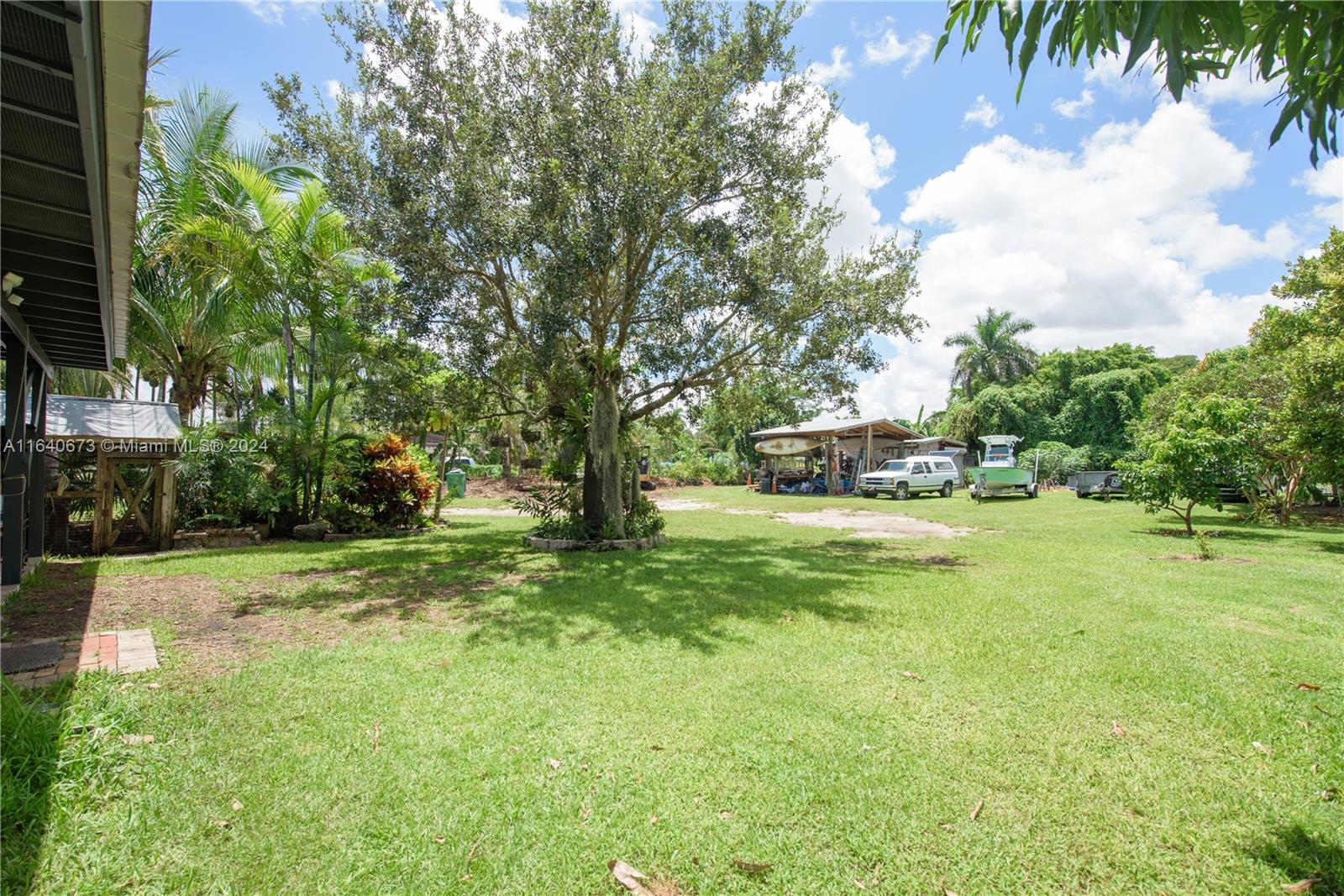 29744 Southwest 170th Avenue Homestead, FL 33030 - Photo 30 of 44 a view of a trees in a yard