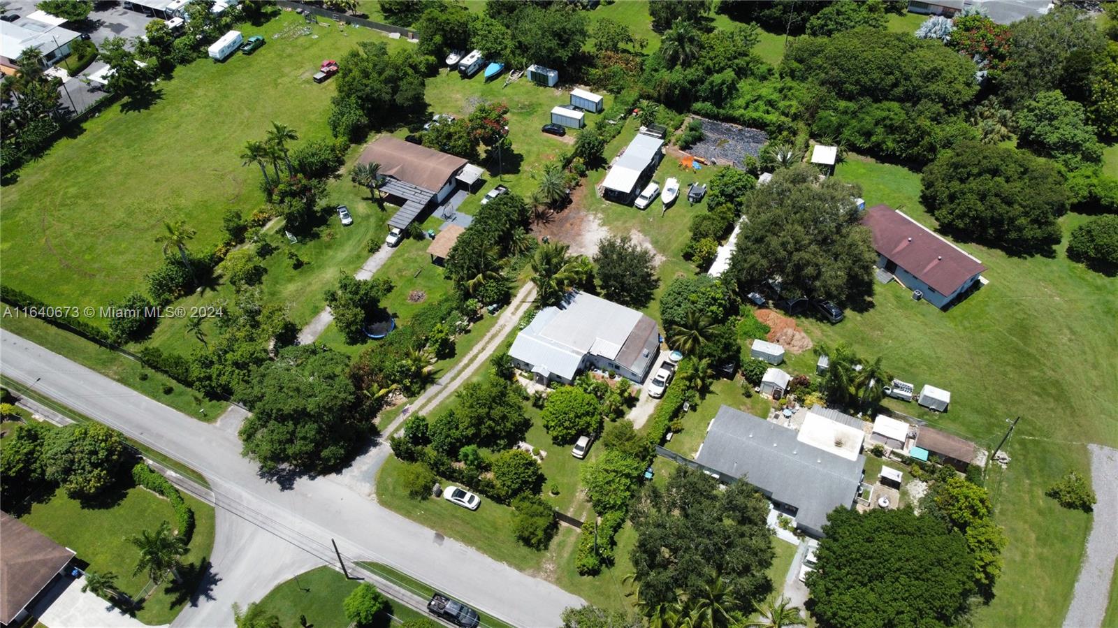 29744 Southwest 170th Avenue Homestead, FL 33030 - Photo 37 of 44 an aerial view of residential house with outdoor space and swimming pool