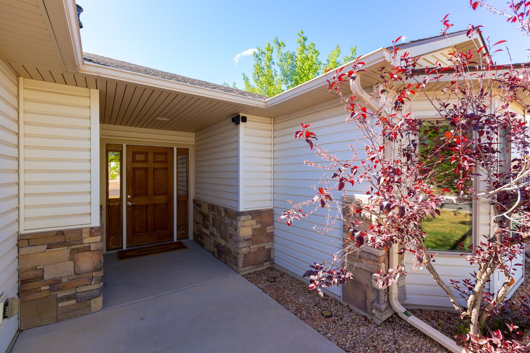 103 Red Rocks Street Fruita, CO 81521 - Photo 2 of 39 a front view of a house