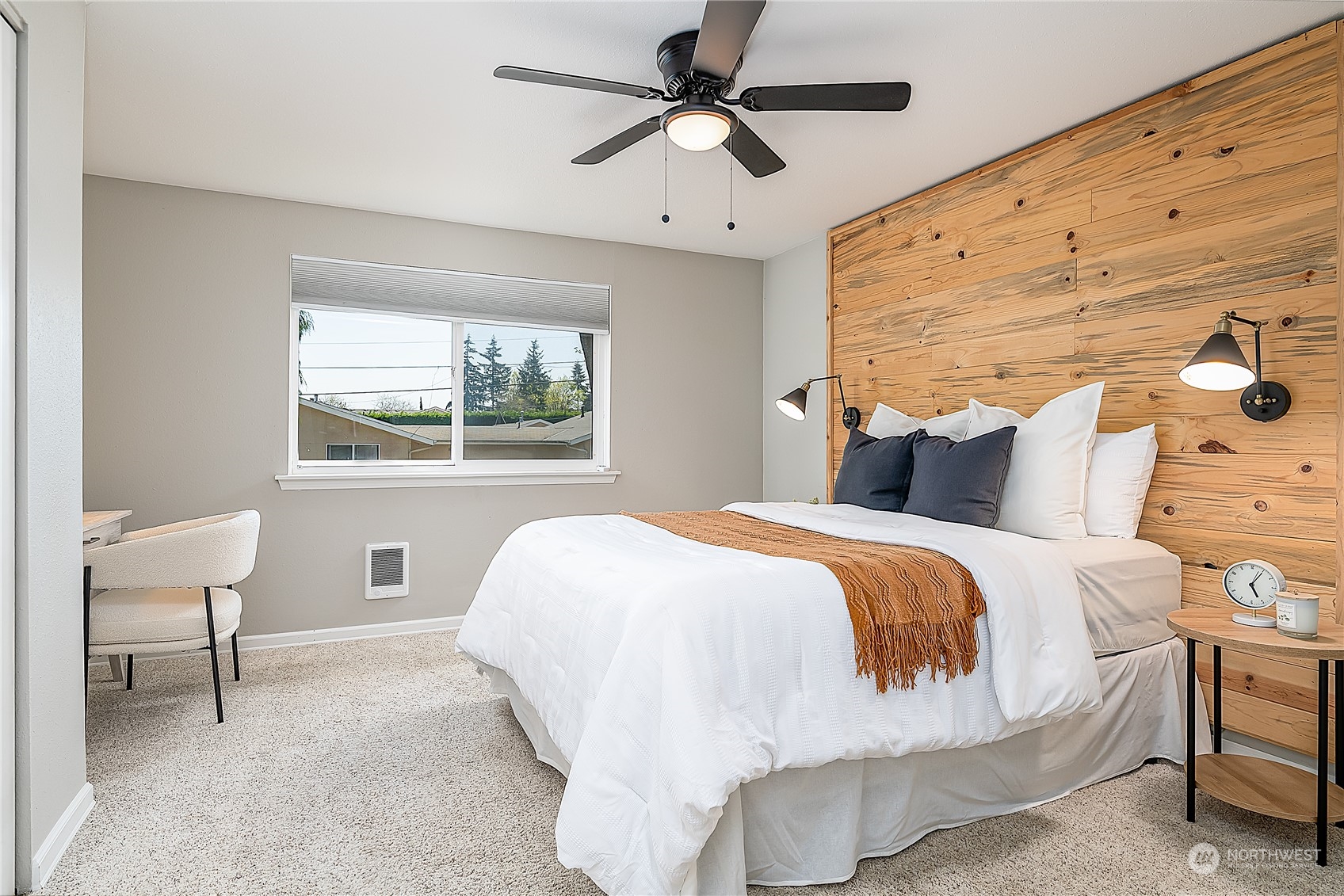 20620 76th Avenue West, Unit D Edmonds, WA 98026 - Photo 11 of 30 a bed room with a bed and a chair