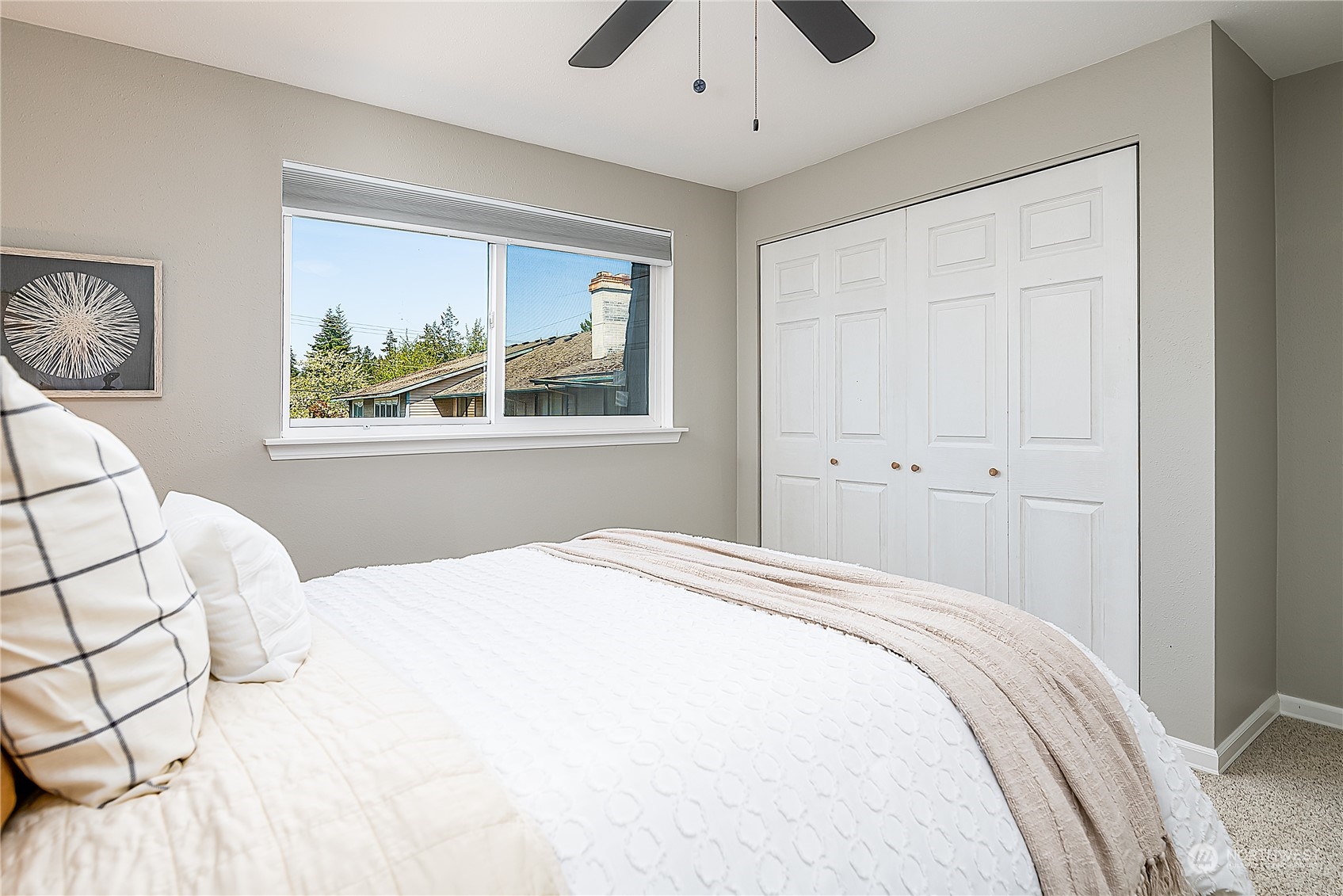 20620 76th Avenue West, Unit D Edmonds, WA 98026 - Photo 14 of 30 a large white bed in a white room
