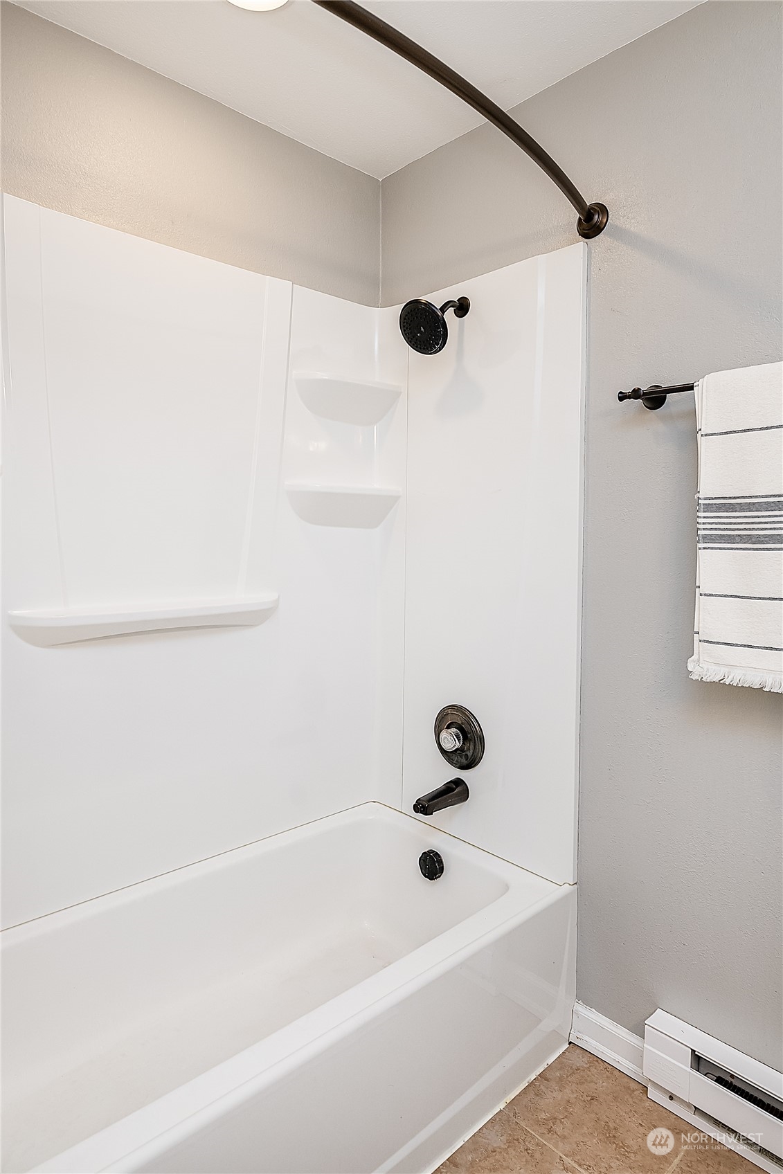 20620 76th Avenue West, Unit D Edmonds, WA 98026 - Photo 16 of 30 a bathroom with a bathtub