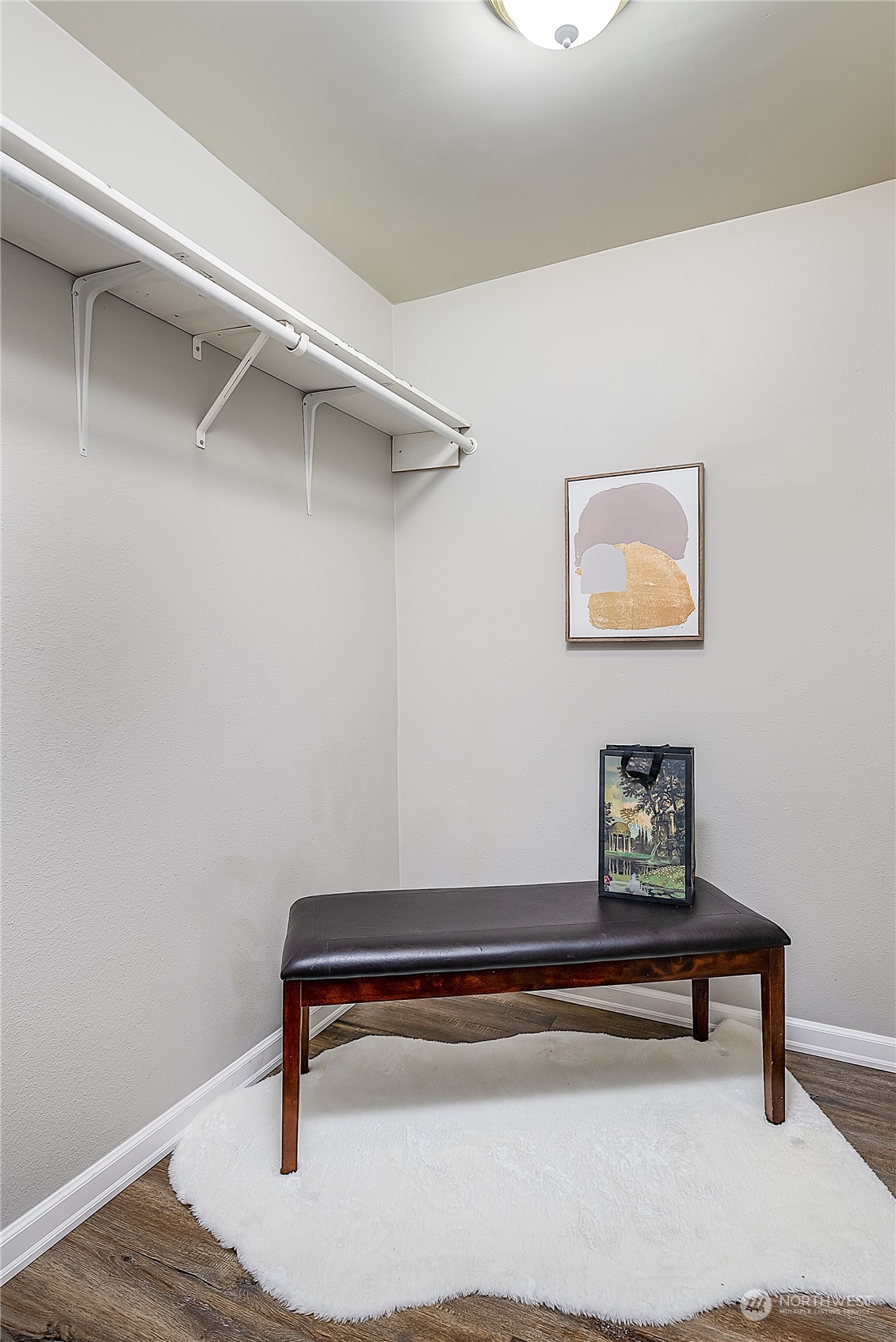 20620 76th Avenue West, Unit D Edmonds, WA 98026 - Photo 17 of 30 a bench sitting in a room