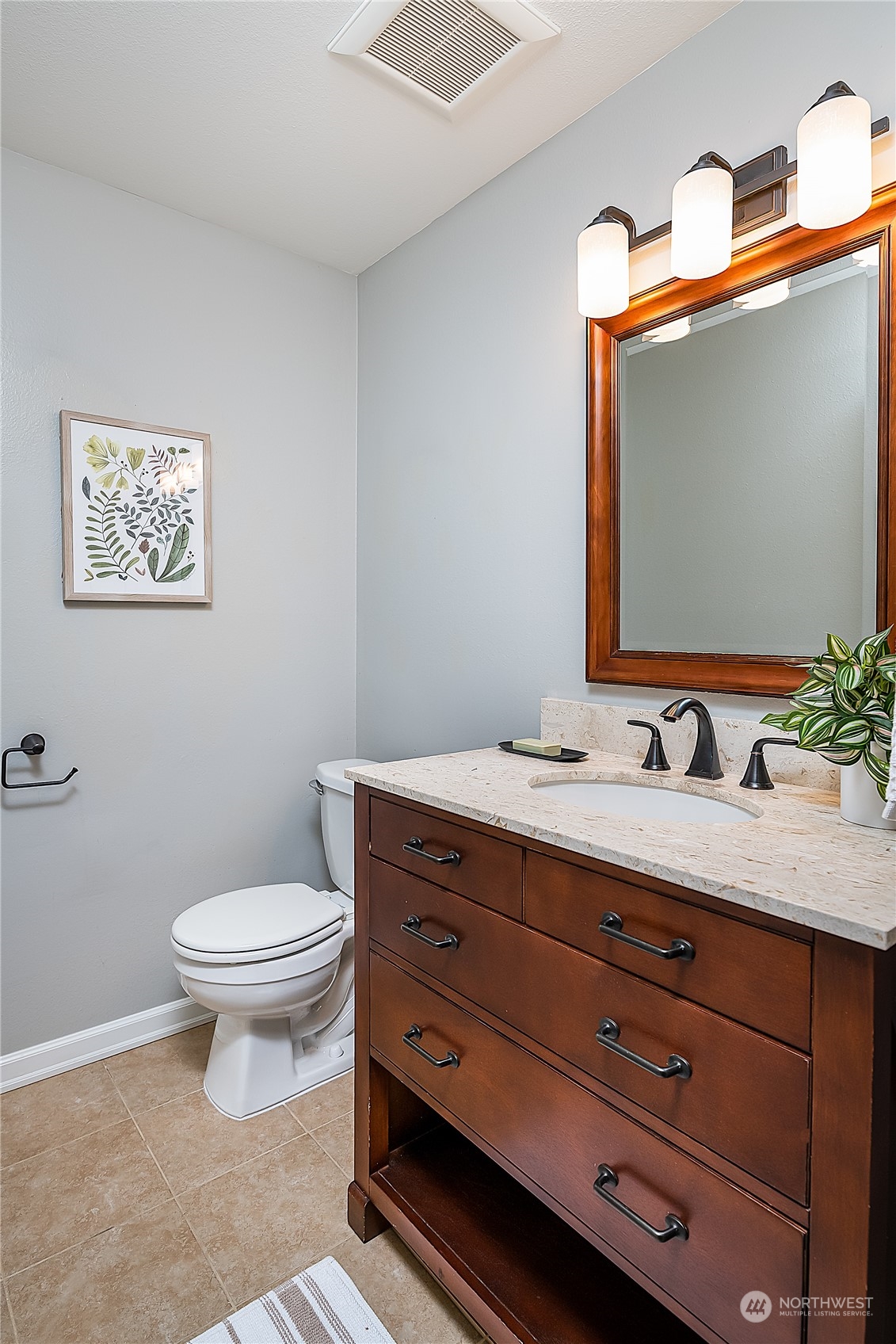 20620 76th Avenue West, Unit D Edmonds, WA 98026 - Photo 18 of 30 a bathroom with a toilet sink and mirror