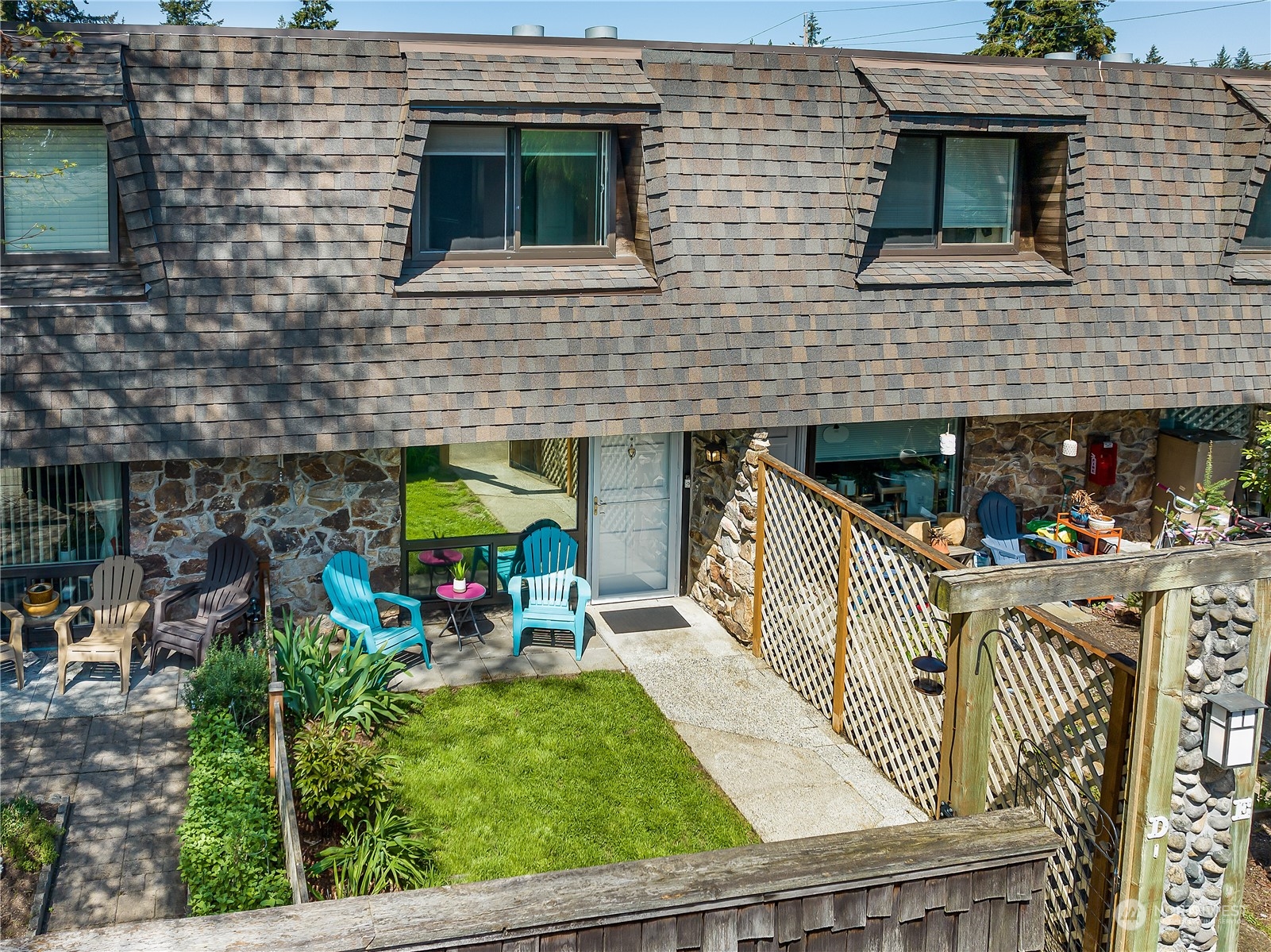 20620 76th Avenue West, Unit D Edmonds, WA 98026 - Photo 23 of 30 a view of house with wooden deck and furniture