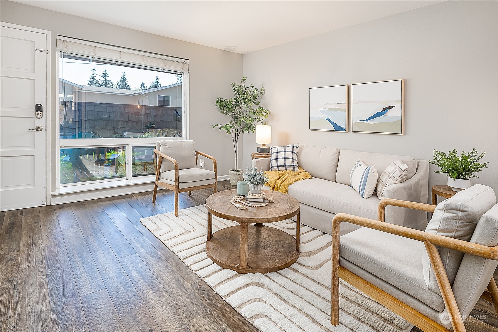 20620 76th Avenue West, Unit D Edmonds, WA 98026 - Photo 5 of 30 a living room with furniture and a large window