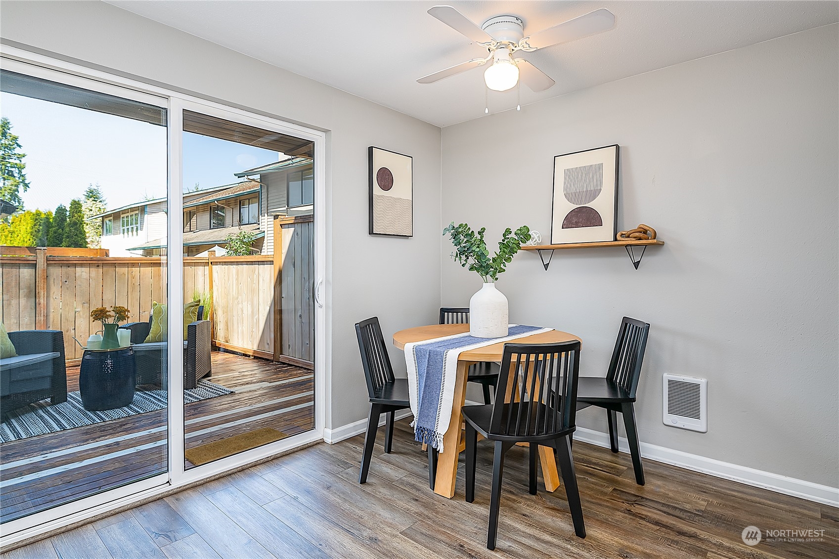 20620 76th Avenue West, Unit D Edmonds, WA 98026 - Photo 6 of 30 a view of a dining room with furniture window and wooden floor