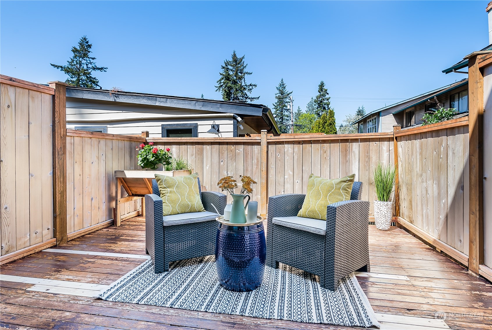 20620 76th Avenue West, Unit D Edmonds, WA 98026 - Photo 7 of 30 a view of a deck with furniture and outside view