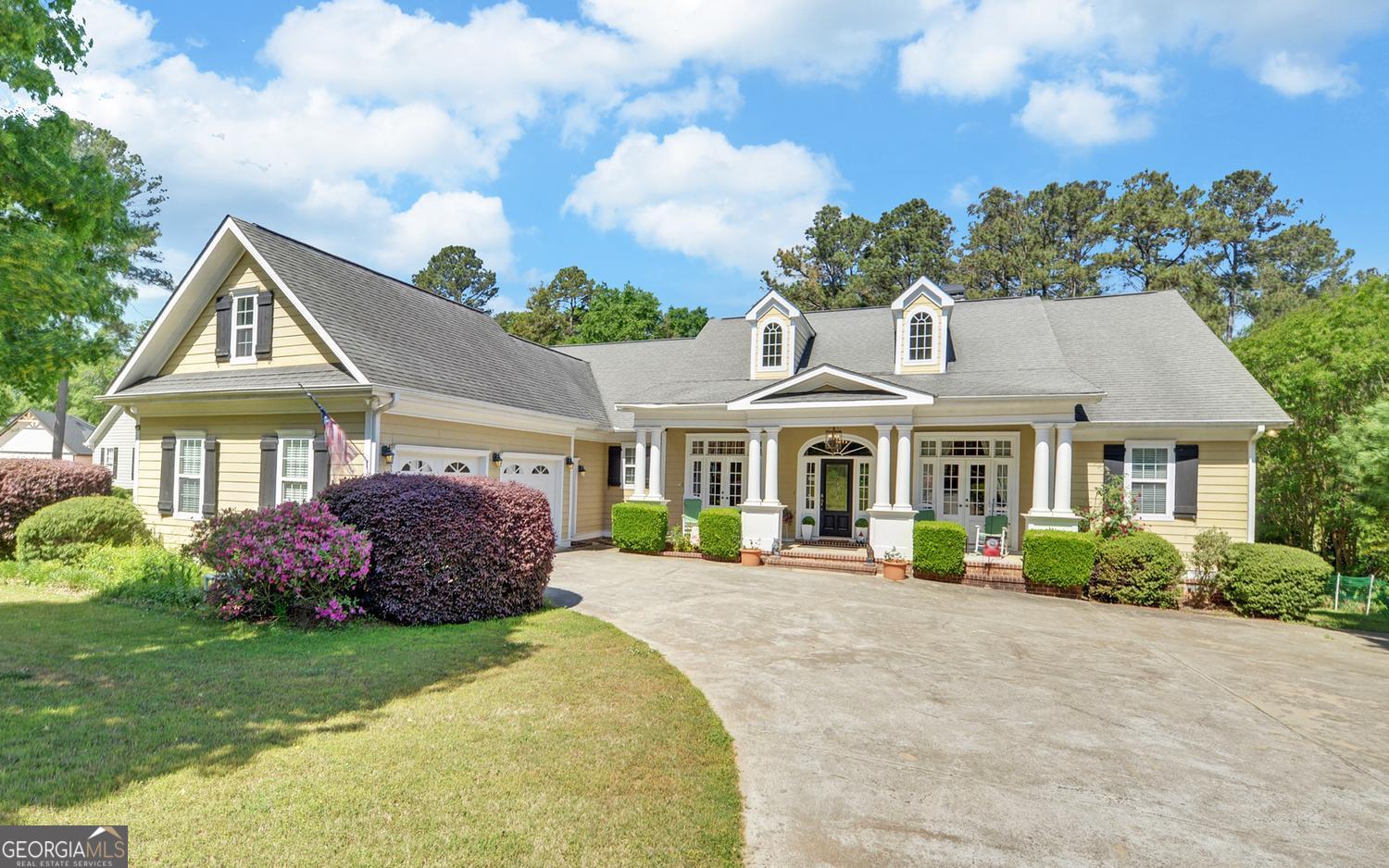 227 Capri Drive Hartwell, GA 30643 - Photo 1 of 75 a front view of a house with a garden