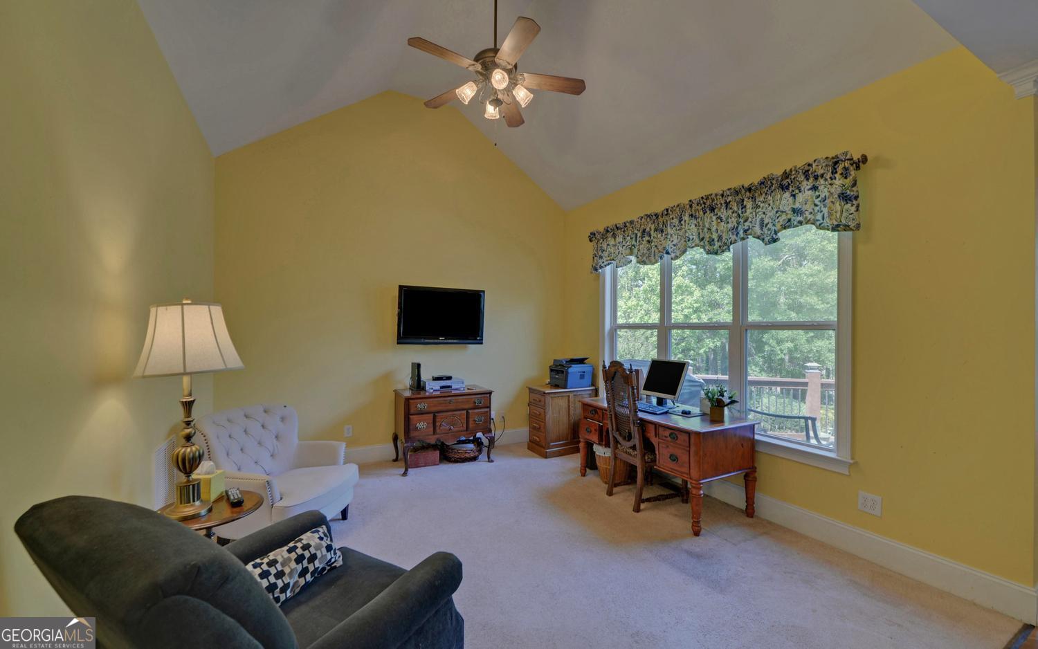 227 Capri Drive Hartwell, GA 30643 - Photo 14 of 75 a living room with furniture and a flat screen tv