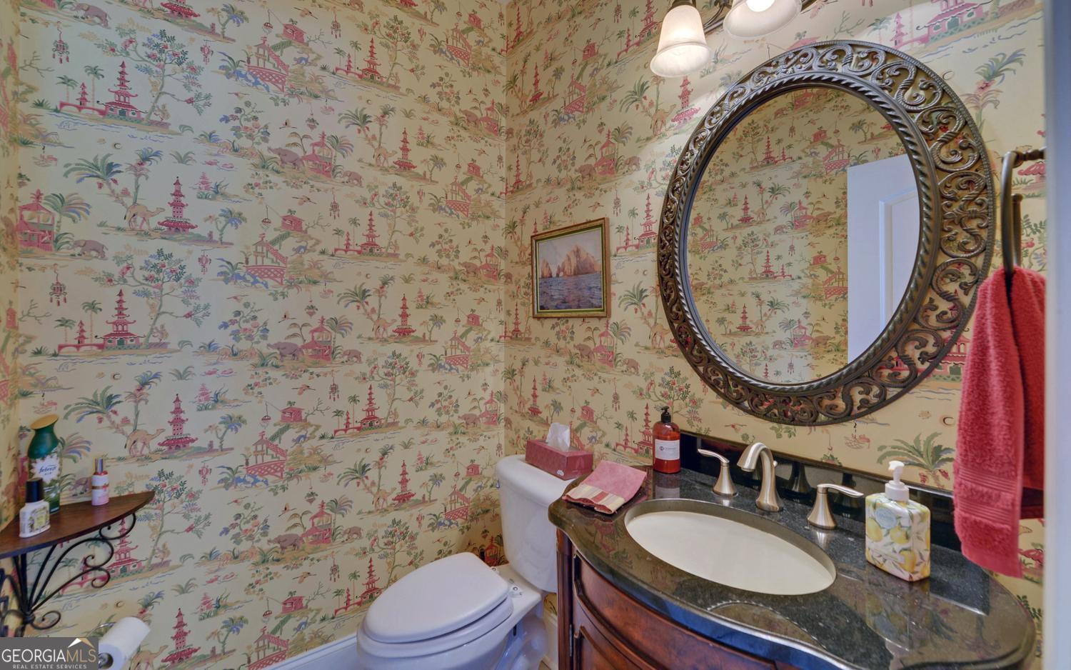 227 Capri Drive Hartwell, GA 30643 - Photo 21 of 75 a bathroom with a sink mirror vanity and toilet