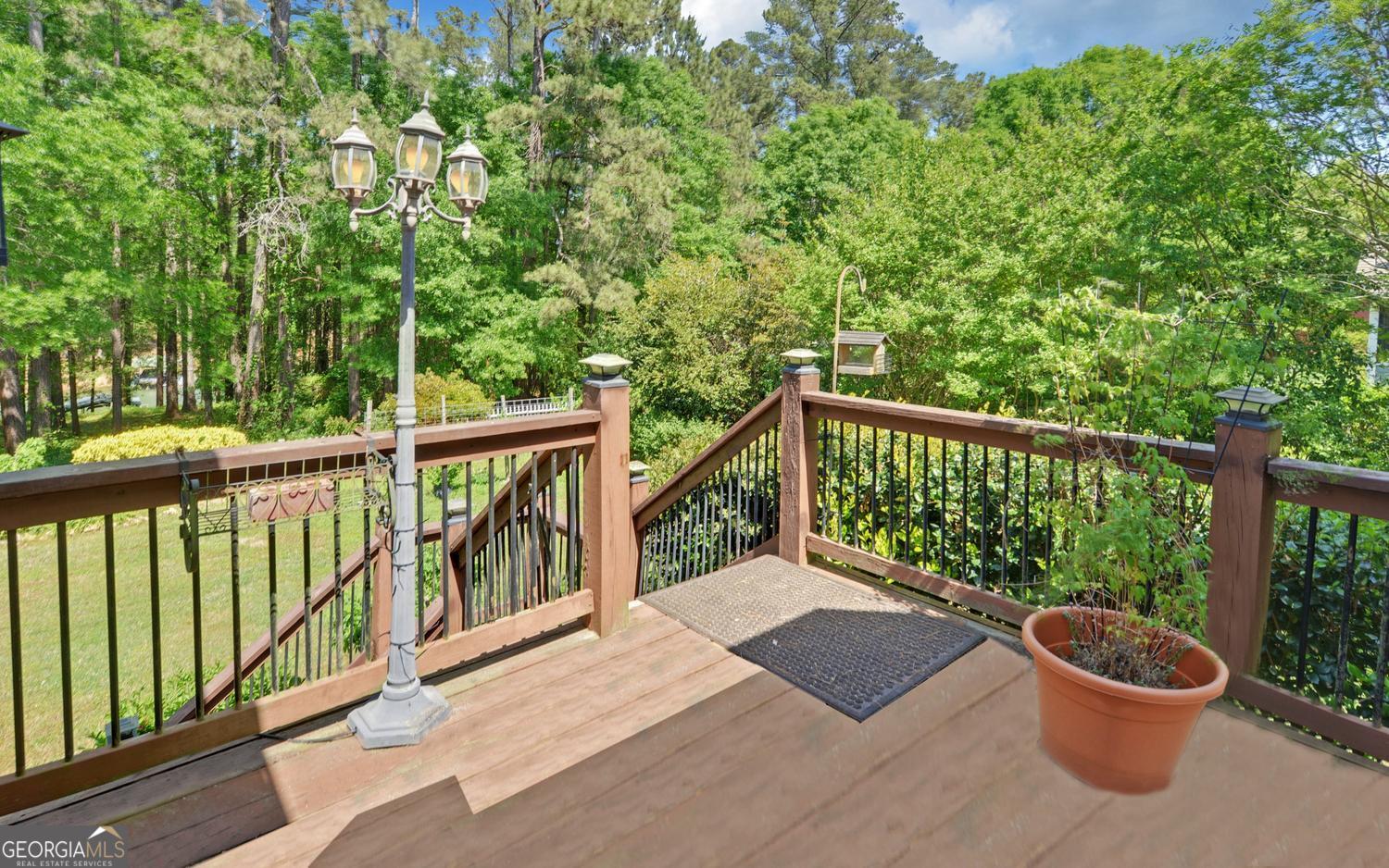 227 Capri Drive Hartwell, GA 30643 - Photo 47 of 75 a view of a balcony with wooden floor