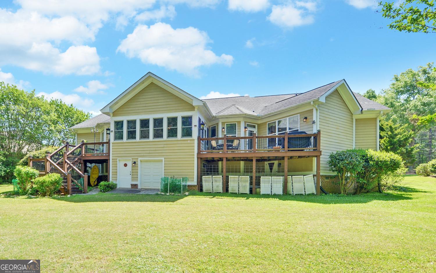 227 Capri Drive Hartwell, GA 30643 - Photo 50 of 75 a house view with a garden space
