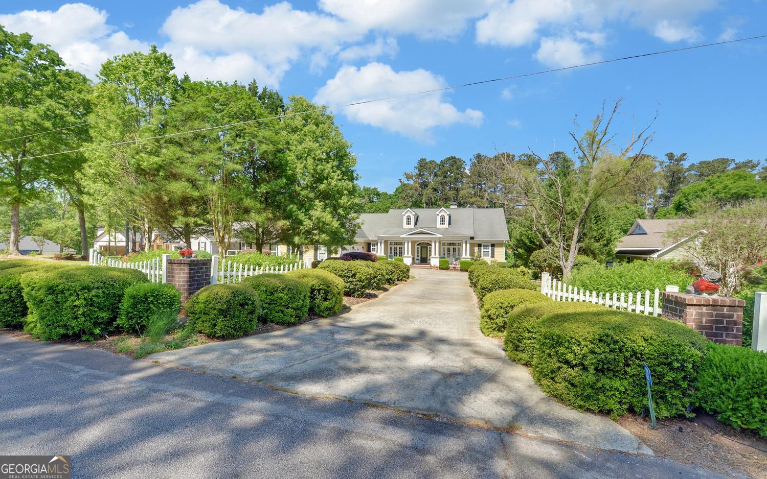 227 Capri Drive Hartwell, GA 30643 - Photo 57 of 75 a view of a street with houses on both side