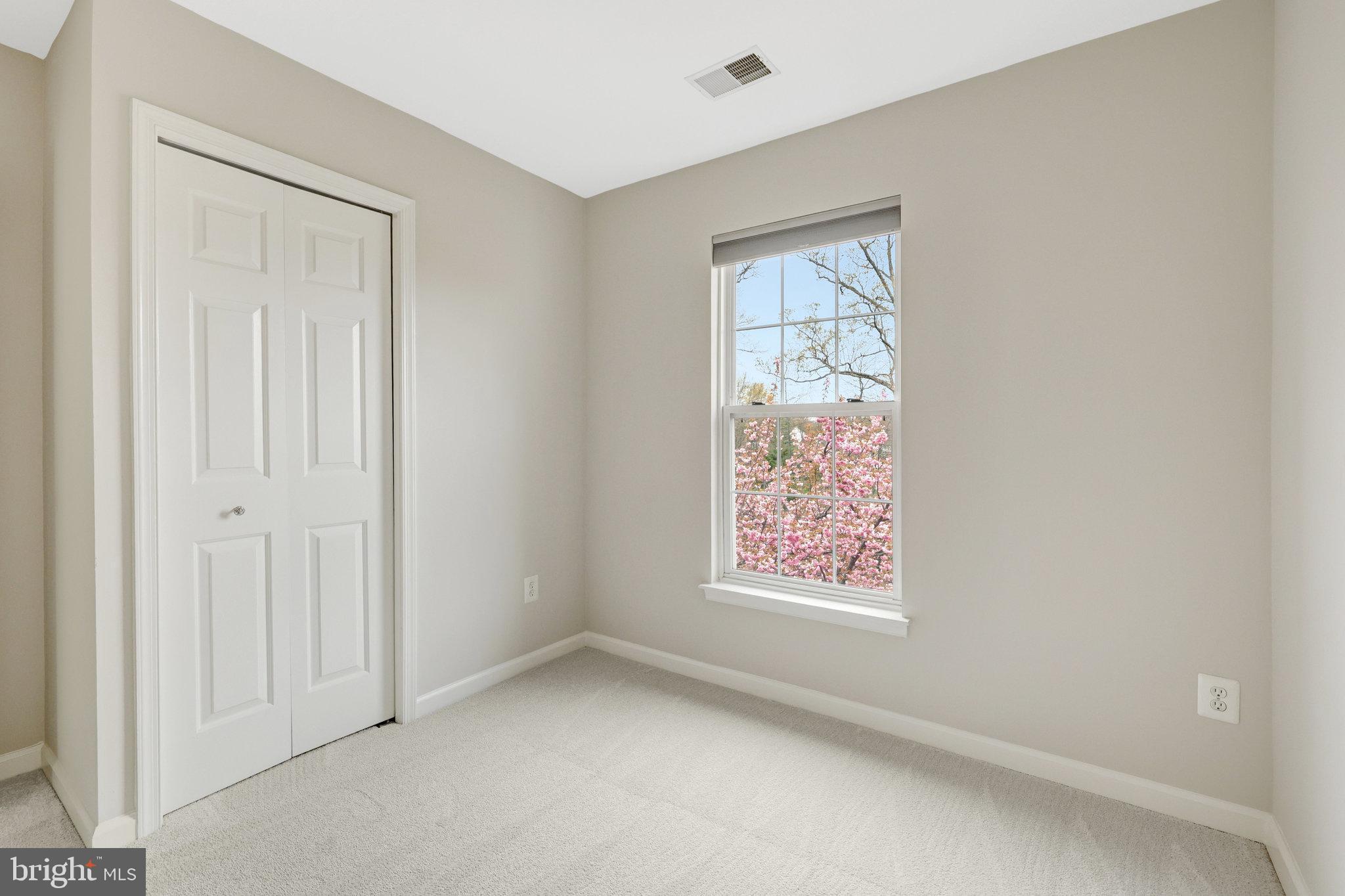 43233 Stillforest Terrace Ashburn, VA 20147 - Photo 18 of 24 an empty room with windows