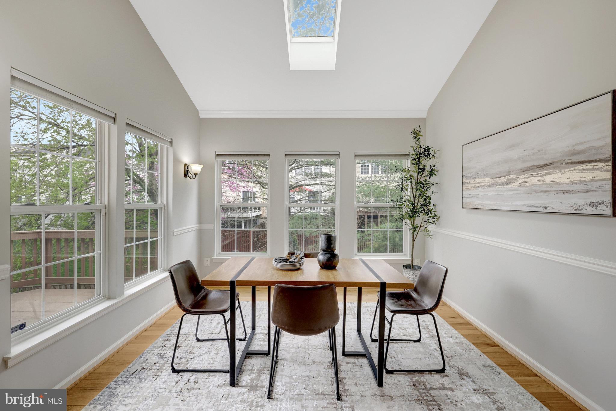 43233 Stillforest Terrace Ashburn, VA 20147 - Photo 9 of 24 a view of a dining room with furniture window and outside view