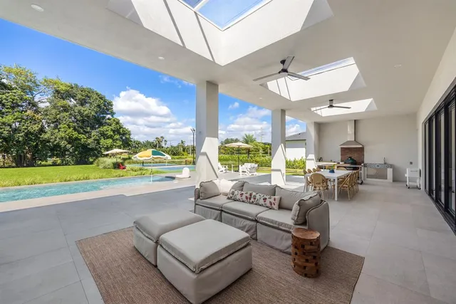 a room with pool table and a entertaining space