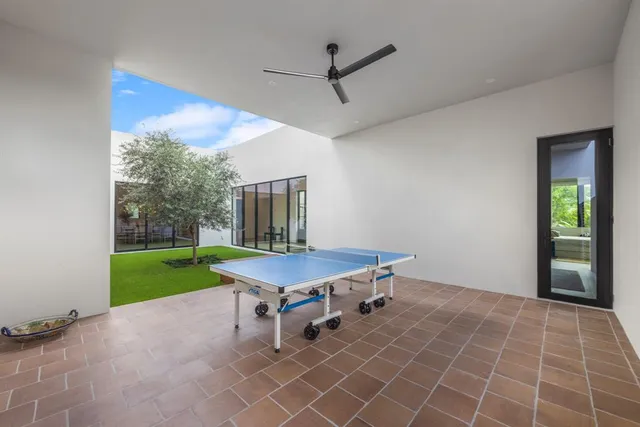 a view of a house with a balcony and door