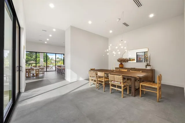 a kitchen with a stove and a table