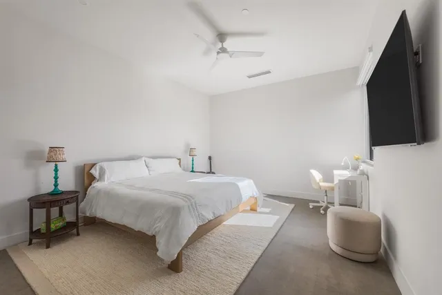 a bathroom with a double vanity sink and mirror