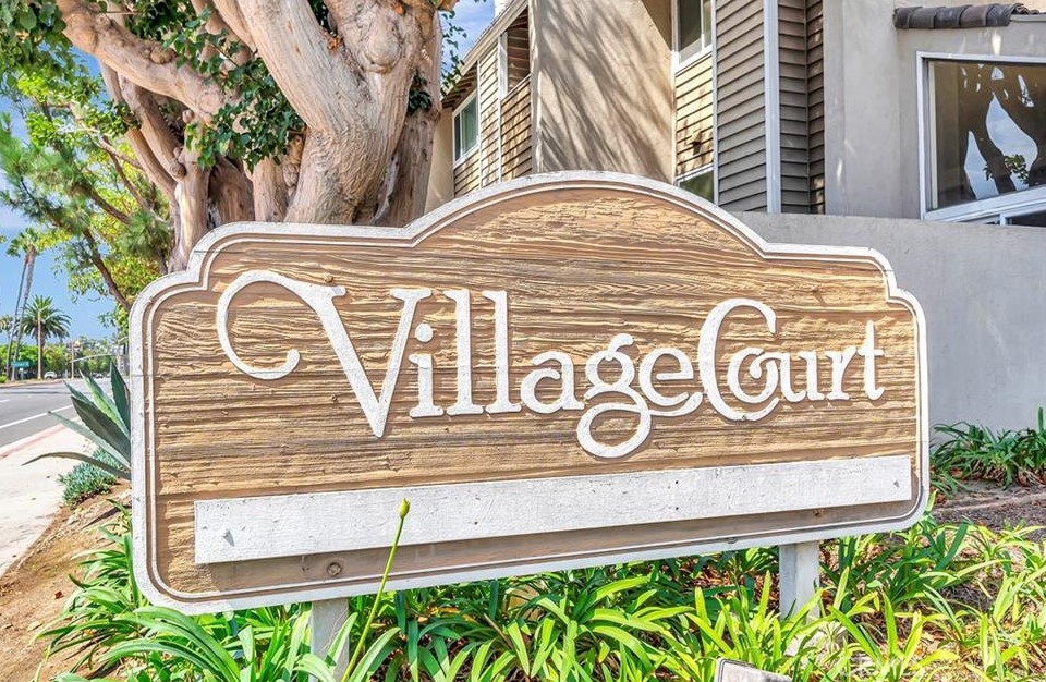 18697 Club Huntington Beach, CA 92648 - Photo 13 of 17 a view of a door with a sign broad