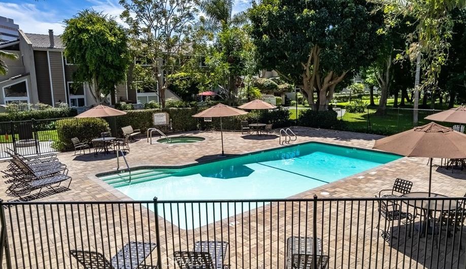 18697 Club Huntington Beach, CA 92648 - Photo 17 of 17 a view of a patio with chairs and a table