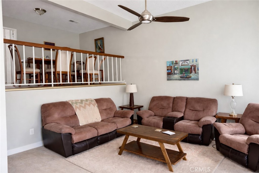 18697 Club Huntington Beach, CA 92648 - Photo 2 of 17 a living room with furniture