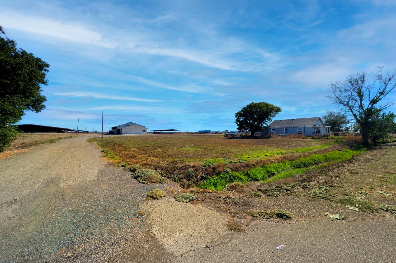 15918 North Jack Tone Road Lodi, CA 95240 - Photo 8 of 67 a view of a lake with a yard